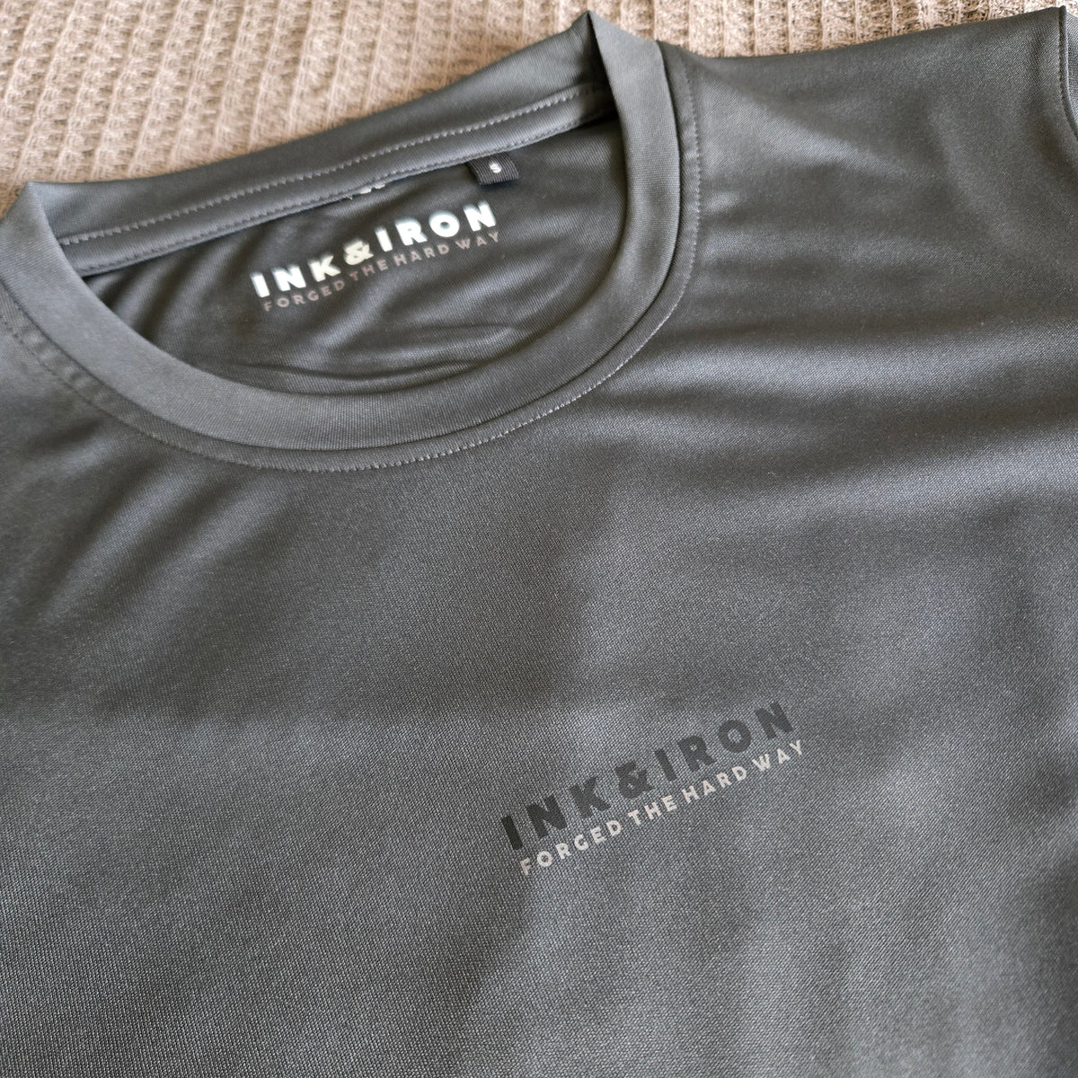 MENS STEALTH PERFORMANCE TEE - FORGED THE HARD WAY