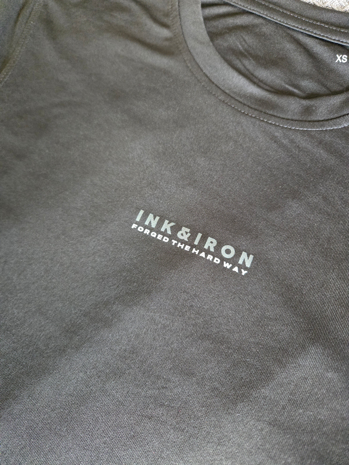 WOMENS STEALTH PERFORMANCE TEE - FORGED THE HARD WAY